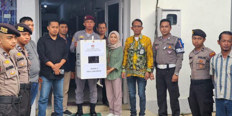 Polres HST Kawal Surat Suara Hasil Rekapitulasi Menuju KPU Kalsel