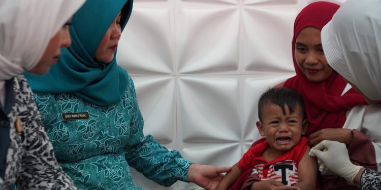 TP PKK dan IBI Kotabaru Gelar Pekan Imunisasi