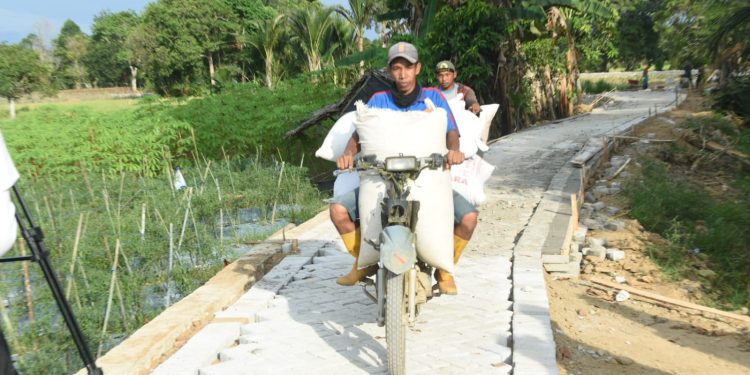 Jalan TMMD Sudah Bisa Digunakan Warga Pengambau Hilir Luar